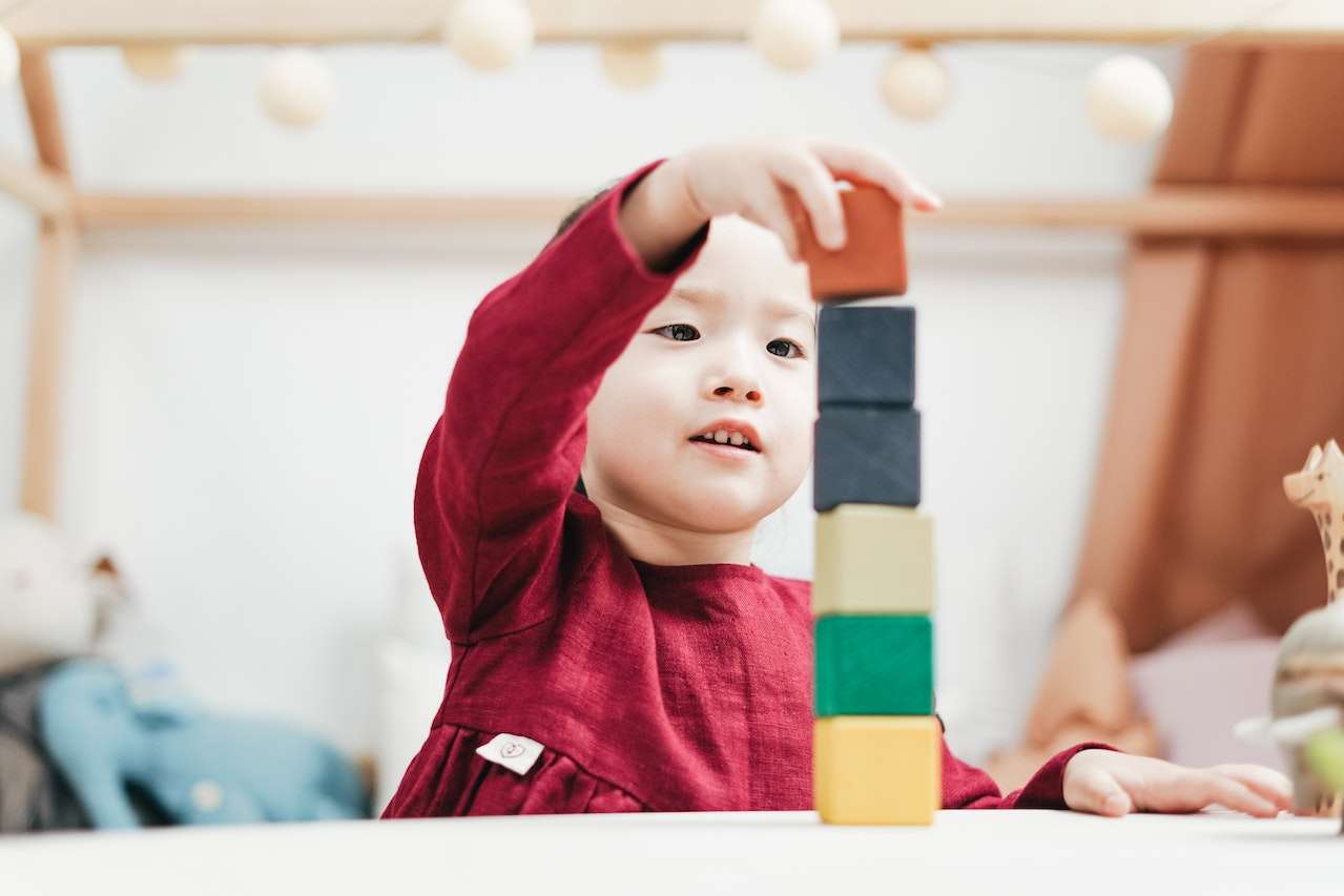 Toddler involved in Montessori Activity